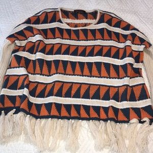 Sweater with fringe on the ends